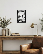 Decoración de oficina con estilo industrial, cuadro calado en madera negra de diseño icónico.