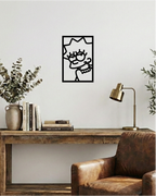 Decoración de oficina con estilo industrial, cuadro calado en madera negra de diseño icónico musical y sobrio.