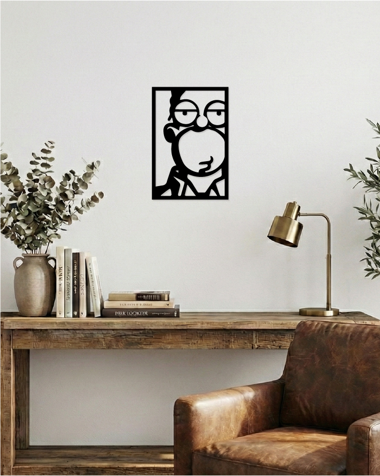 Decoración de oficina con estilo industrial, cuadro calado en madera negra de diseño icónico con toque de humor.